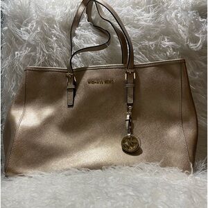 Michael Kors gently used small Jet Set God Metallic Tote Bag